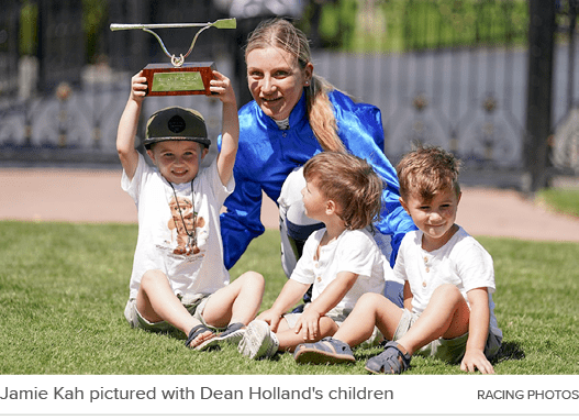 Jamie Kah pictured with Dean Holland's children racing photo